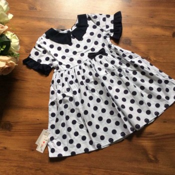 Váy nhỡ chấm bi size 4 -8 chất thô